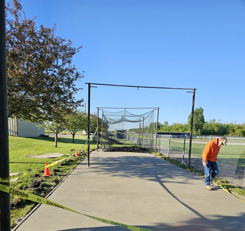 Concrete pad poured for a commercial batting cage facility