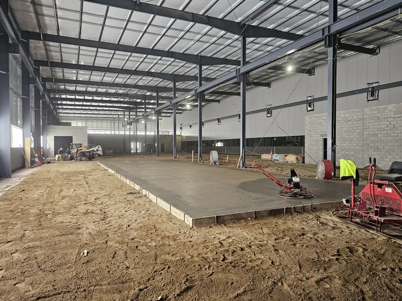 Commercial concrete slab placement inside a Mid-Michigan industrial building