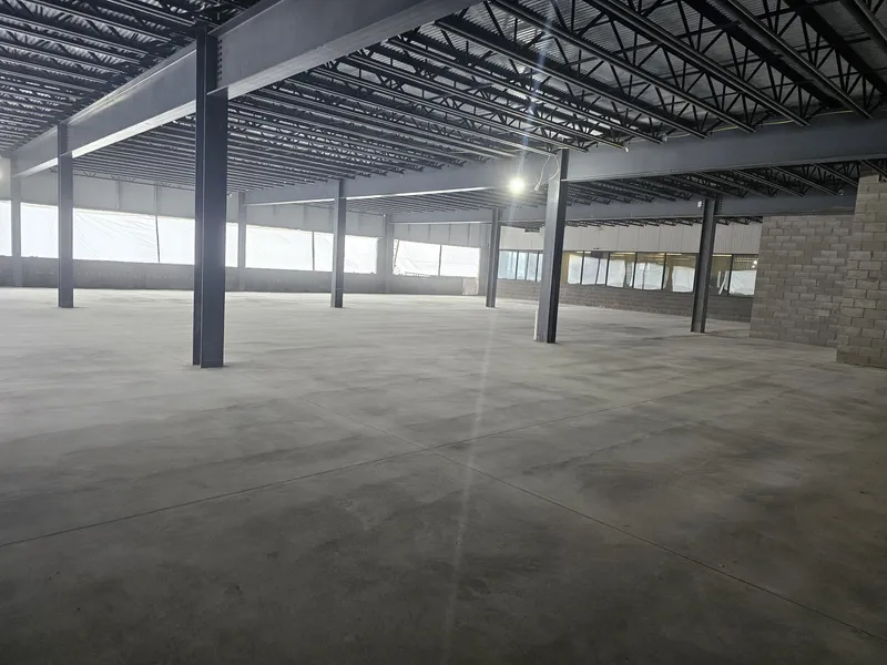 Large commercial warehouse concrete floor finished smooth and level