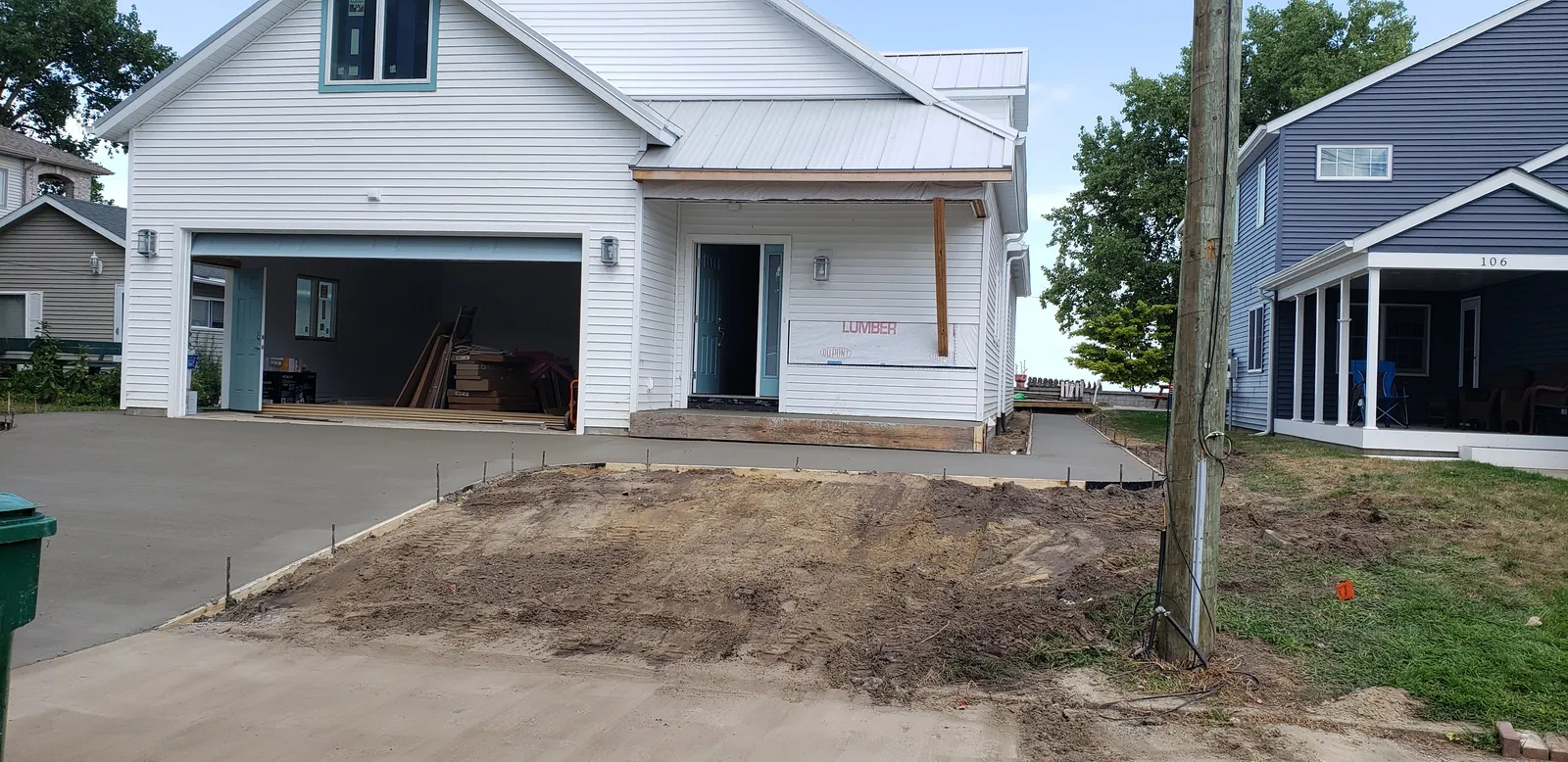 New concrete driveway at a lakeside home build in Mid-Michigan