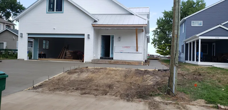 New concrete driveway at a lakeside home build in Mid-Michigan