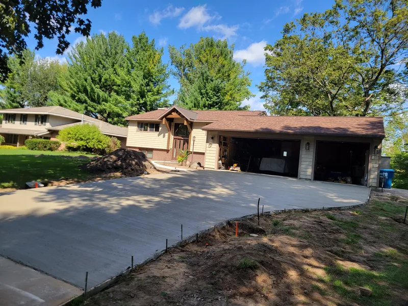 Concrete driveway at a split-level home in Mid-Michigan