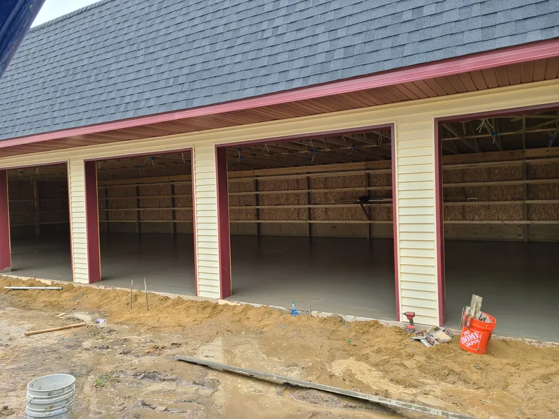 Concrete floor poured across multiple bays of a Mid-Michigan pole barn