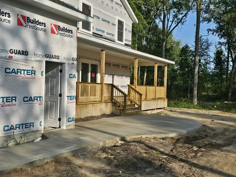 Concrete porch slab poured at a new-construction home